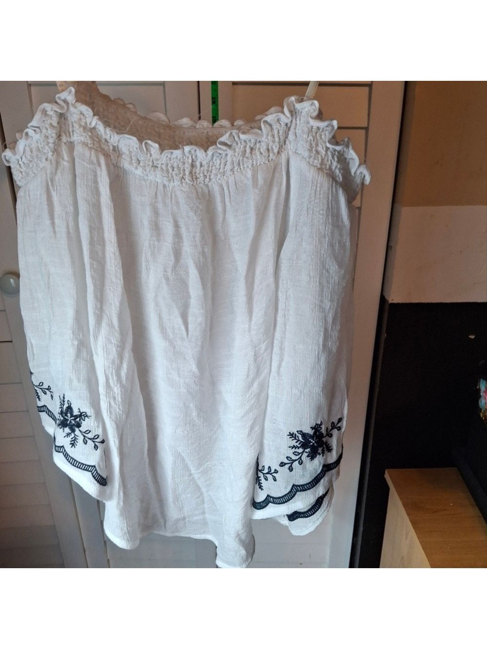 E M White Off-Shoulder Top with Blue Embroidery
